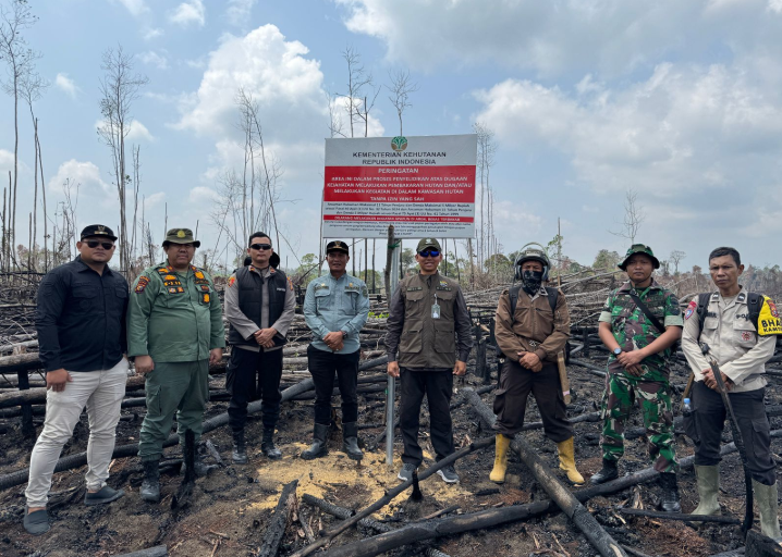 Polsek Singingi Hilir Gelar Patroli Gabungan, Pasang Spanduk dan Plang Larangan Membakar Hutan Serta Tanam Pohon di Kawasan Konservasi